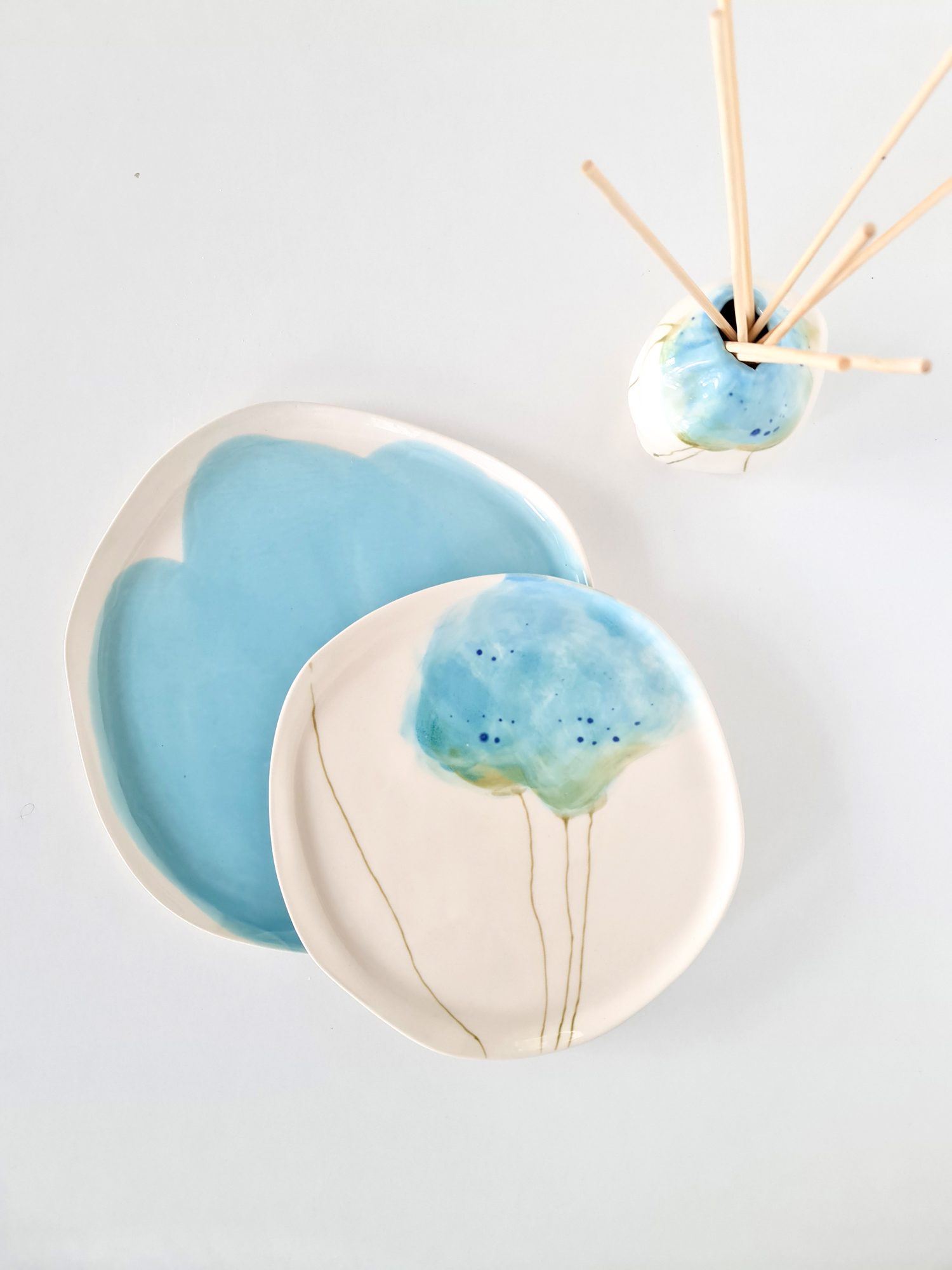 LaLi-collection----the-forgetmenot-series Handmade porcelain drinkware including cups and tumblers.